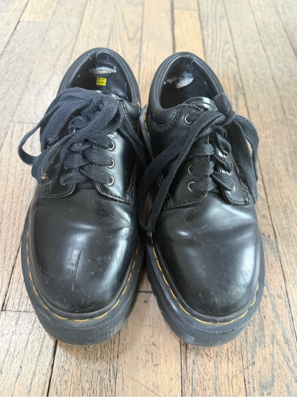 Dr. Martens Black Leather Platform Lace-Up Shoes with Yellow Stitching